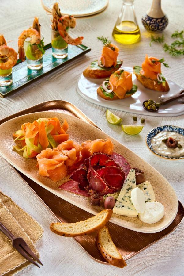 Benben By Dhara Hotels - Adults Only Asuán Exteriér fotografie Smoked salmon